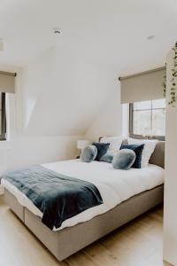 Кровать или кровати в номере Ramslo