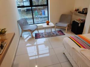 Χώρος καθιστικού στο Hotel White Fields Hitec City, Hyderabad