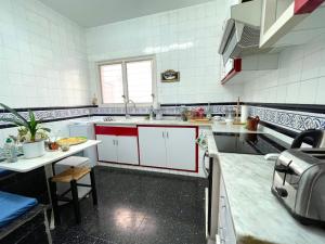 Kuchyňa alebo kuchynka v ubytovaní La Torre 32 atic