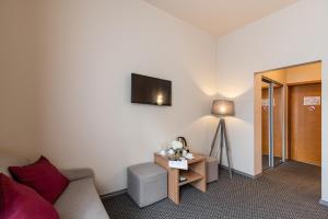 TV a/nebo společenská místnost v ubytování Hotel Sigulda