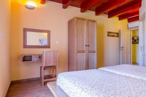 Postel nebo postele na pokoji v ubytování Pool Terrace Relax & Fun Villa Fuma + 34 fotografií