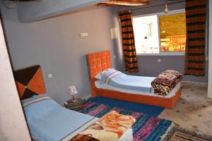 Postel nebo postele na pokoji v ubytování Riad Dar Tagine + 27 fotografií