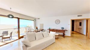 A seating area at Lomas de los Monteros - Apartment with seaviews