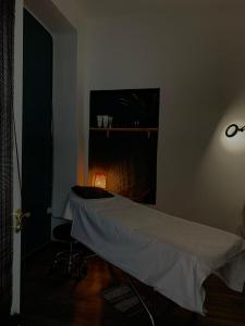 A bed or beds in a room at Maria Magdalena - Room 7