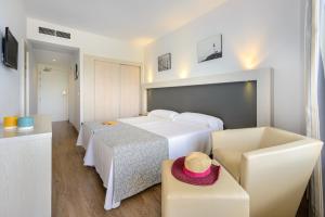Postel nebo postele na pokoji v ubytování Hotel Vibra Beverly Playa