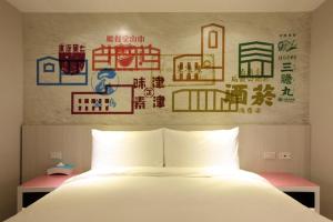 Postel nebo postele na pokoji v ubytování Wholesome Hotel