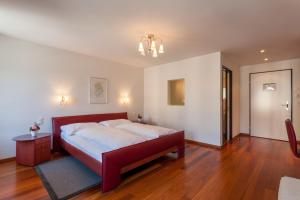 מיטה או מיטות בחדר ב-Weisses Rössli Swiss Quality Hotel