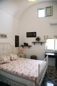 A bed or beds in a room at La Casina Della Quiete