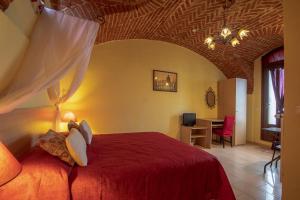 Postel nebo postele na pokoji v ubytování La Valle B&B