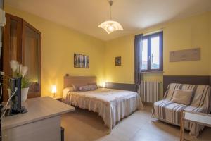 Postel nebo postele na pokoji v ubytování La Valle B&B