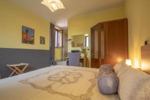 Postel nebo postele na pokoji v ubytování La Valle B&B