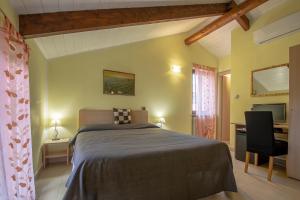 Postel nebo postele na pokoji v ubytování La Valle B&B