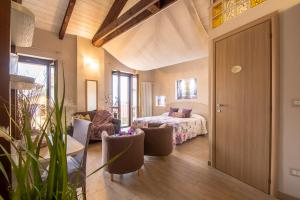 Postel nebo postele na pokoji v ubytování La Valle B&B