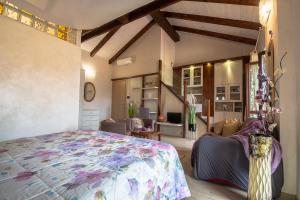 Postel nebo postele na pokoji v ubytování La Valle B&B