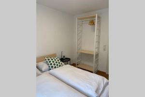 Posteľ alebo postele v izbe v ubytovaní Wohnung 2 in zentraler Lage im Rheintal