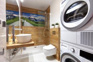 Koupelna v ubytování Tatra Square Apartments + 37 fotografií