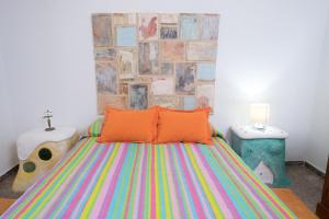 A bed or beds in a room at Casa de María
