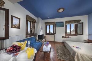 Postel nebo postele na pokoji v ubytování Hotel Petradi