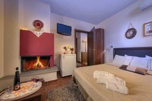 Postel nebo postele na pokoji v ubytování Hotel Petradi