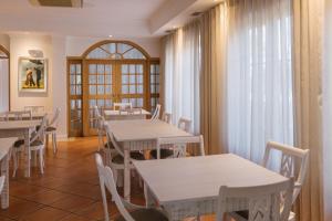 Reštaurácia alebo iné gastronomické zariadenie v ubytovaní Quinta do Eden