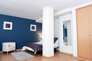 Posteľ alebo postele v izbe v ubytovaní Fira Duplex