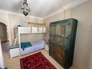 Llit o llits en una habitació de Taghazout Ocean View
