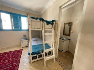 Llit o llits en una habitació de Taghazout Ocean View