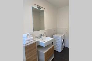 Koupelna v ubytování Terrassenwohnung in Götzis + 10 fotografií