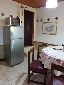 A kitchen or kitchenette at Wanda Apart Hotel Las Palmas