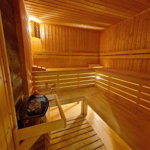 an inside view of a wooden sauna at Family Hotel Chiflik Hills in Chiflik