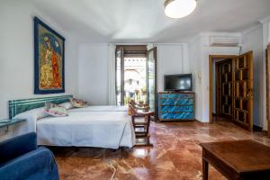Postel nebo postele na pokoji v ubytování Apartamento con patio cordobés en San Basilio & Parking