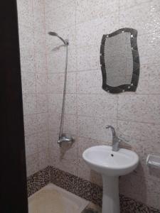 Koupelna v ubytování Magtas Hotel