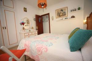 Postel nebo postele na pokoji v ubytování La Casa de La Abuela Rosy