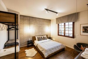 A bed or beds in a room at Fort D-Val luxurious apartment