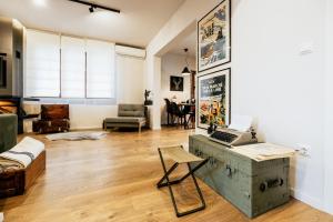 A television and/or entertainment centre at Fort D-Val luxurious apartment