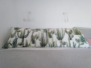 A bed or beds in a room at Serifos Sugar Cubes