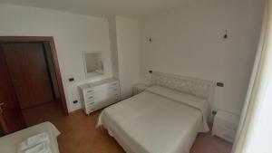 Posteľ alebo postele v izbe v ubytovaní Don Diego Apartment Orosei