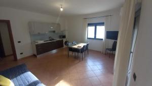 Kuchyňa alebo kuchynka v ubytovaní Don Diego Apartment Orosei