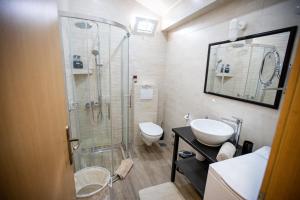 Koupelna v ubytování Apartments Kanevce Beach&Relax + 35 fotografií