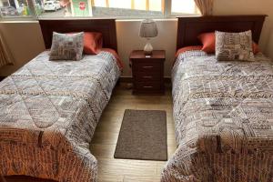 Een bed of bedden in een kamer bij Panchi´s House