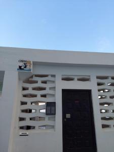 a building with a ceiling with holes in it at Acqua Marine in Sesimbra