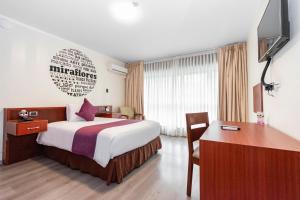 Postel nebo postele na pokoji v ubytování Hotel Andesmar