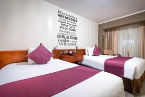 Postel nebo postele na pokoji v ubytování Hotel Andesmar