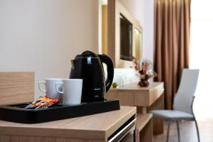 Удобства за правене на кафе и чай в Maria Palace Hotel - All Inclusive