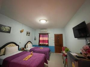 Postel nebo postele na pokoji v ubytování Diamond Resort