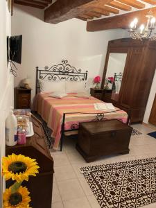 A bed or beds in a room at Affittacamere Mirella