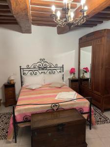 A bed or beds in a room at Affittacamere Mirella