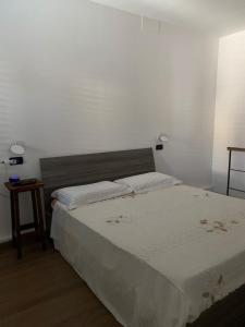Posteľ alebo postele v izbe v ubytovaní B&B Il Dolce Dormire