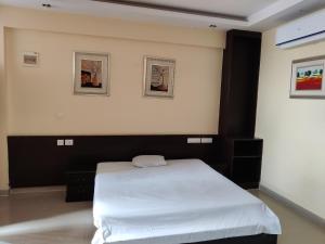 Cama o camas de una habitación en Fernandes Complex