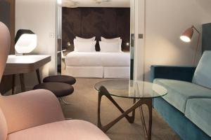 Postel nebo postele na pokoji v ubytování Hotel Dupond-Smith